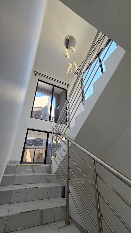 Twin double storey houses