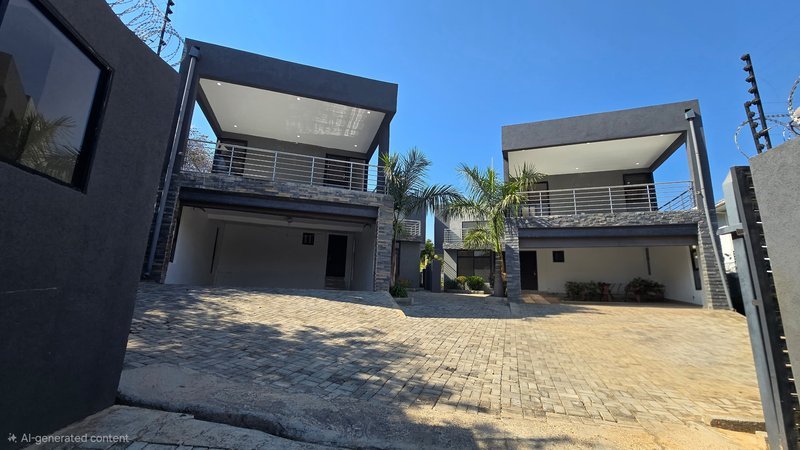 Twin double storey houses