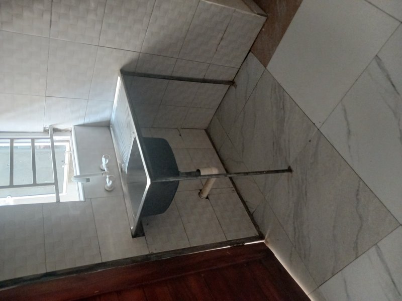 Simple 2-beds semi-detached flat in Obama Ranchdale
