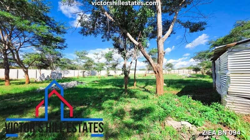 1 acre fenced plot for sale