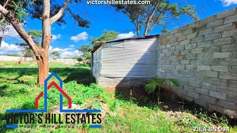 1 acre fenced plot for sale