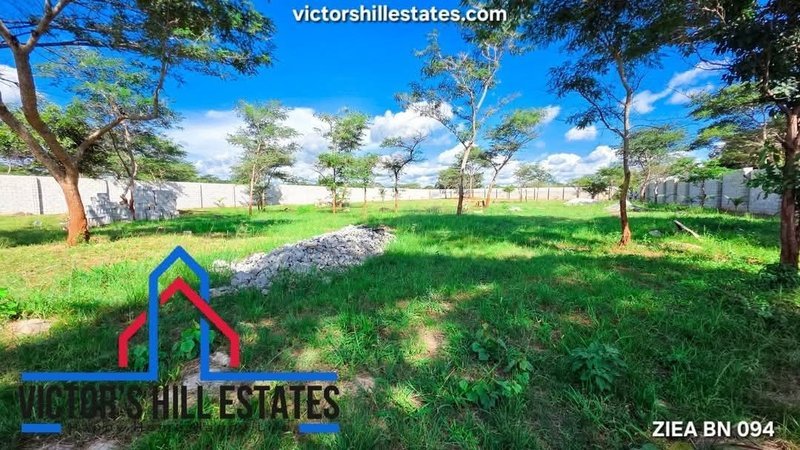1 acre fenced plot for sale